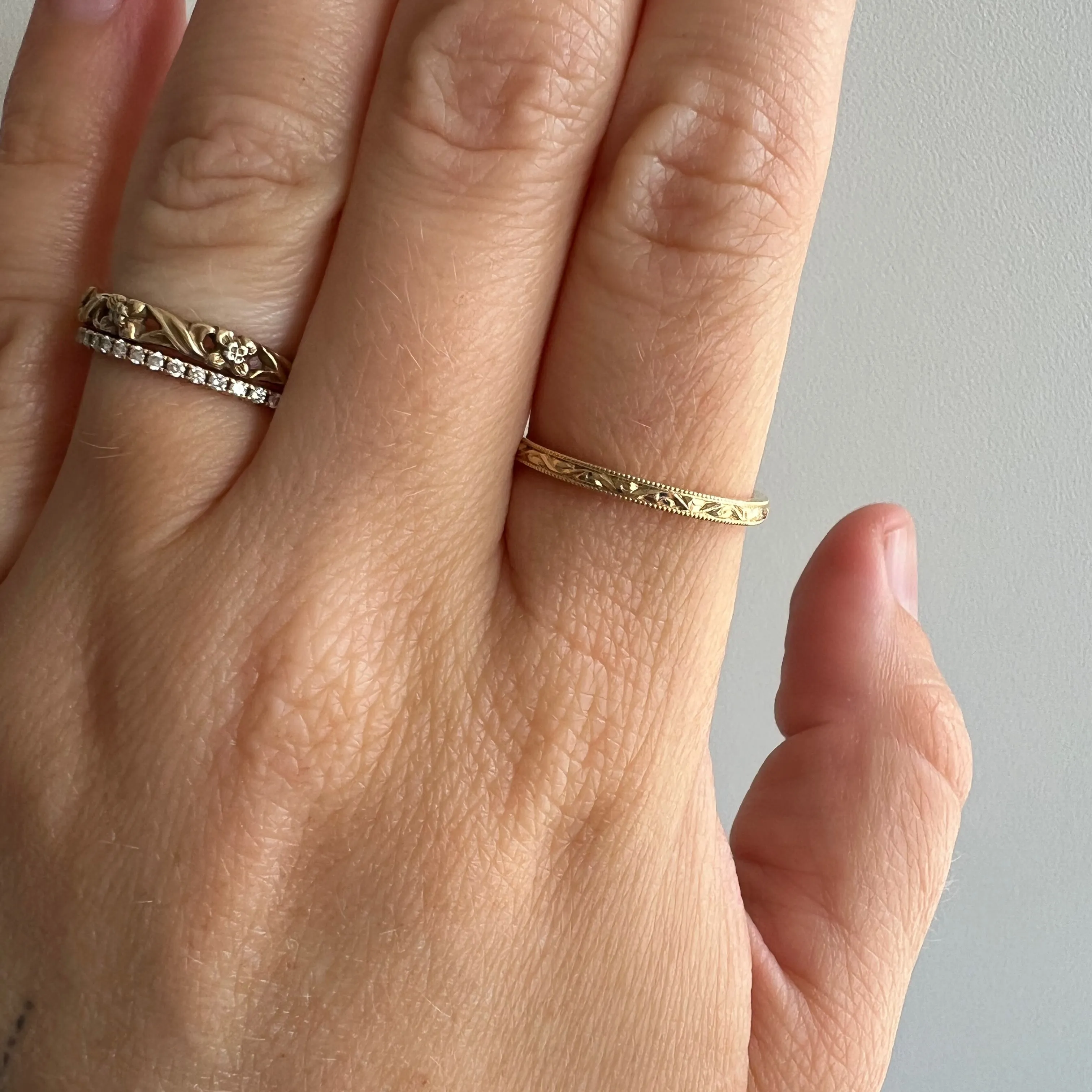 P R E - L O V E D // tiniest paisleys / 14k yellow gold skinny stacking band / size 7