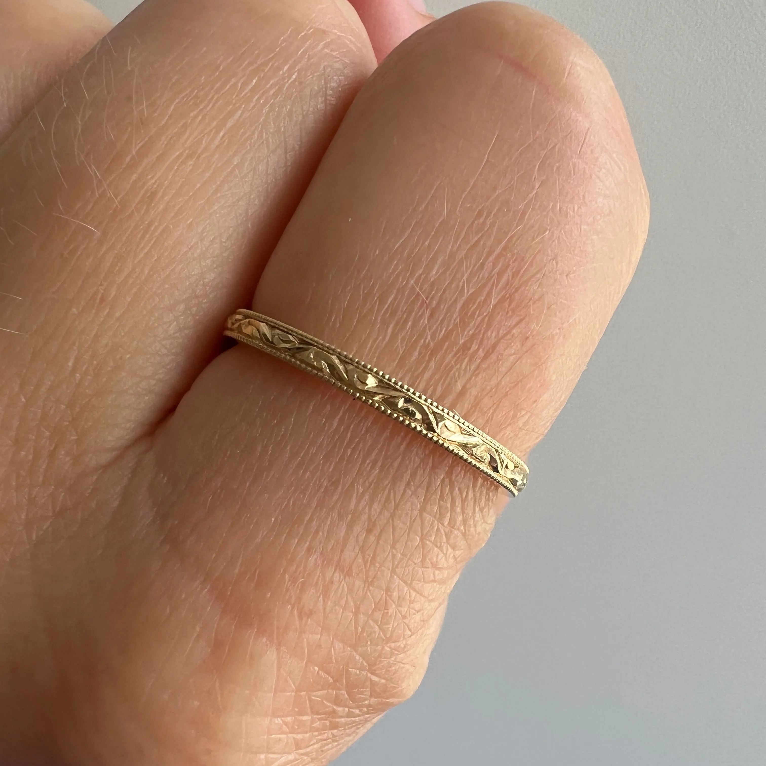 P R E - L O V E D // tiniest paisleys / 14k yellow gold skinny stacking band / size 7